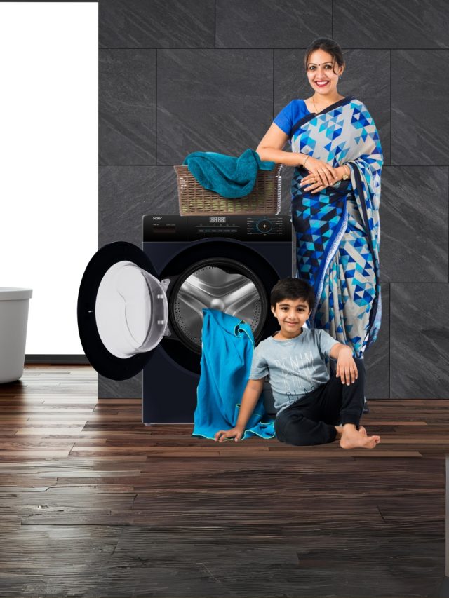 Mother with child near washing machine