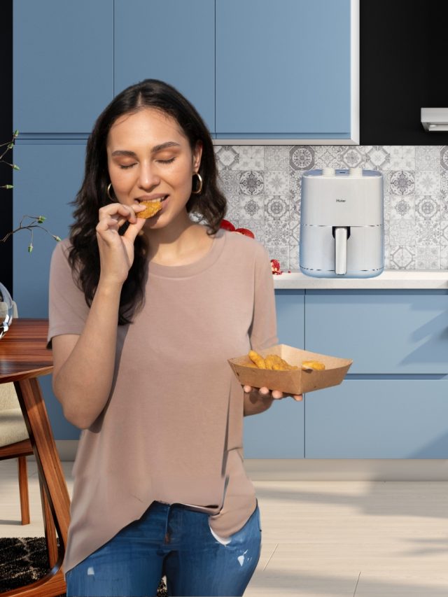 Woman having air fried Chips