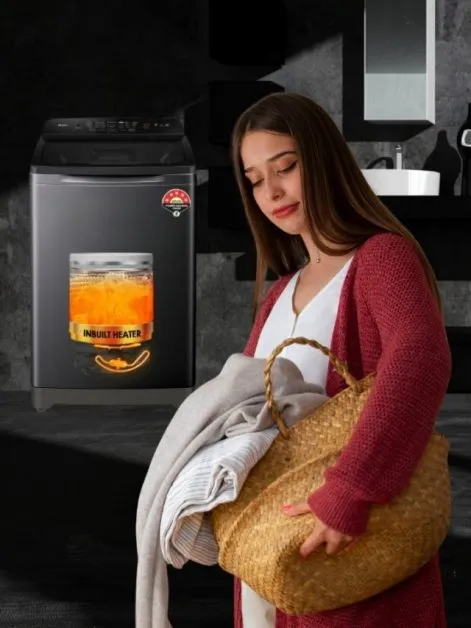 woman cleaning comforter in washing machine