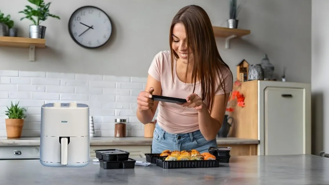 Taking photograph of her air fried food