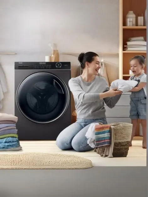 Front load washing machine and woman washing clothes