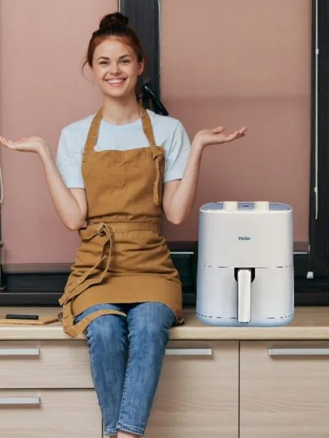 Woman is Happy using Air fryer